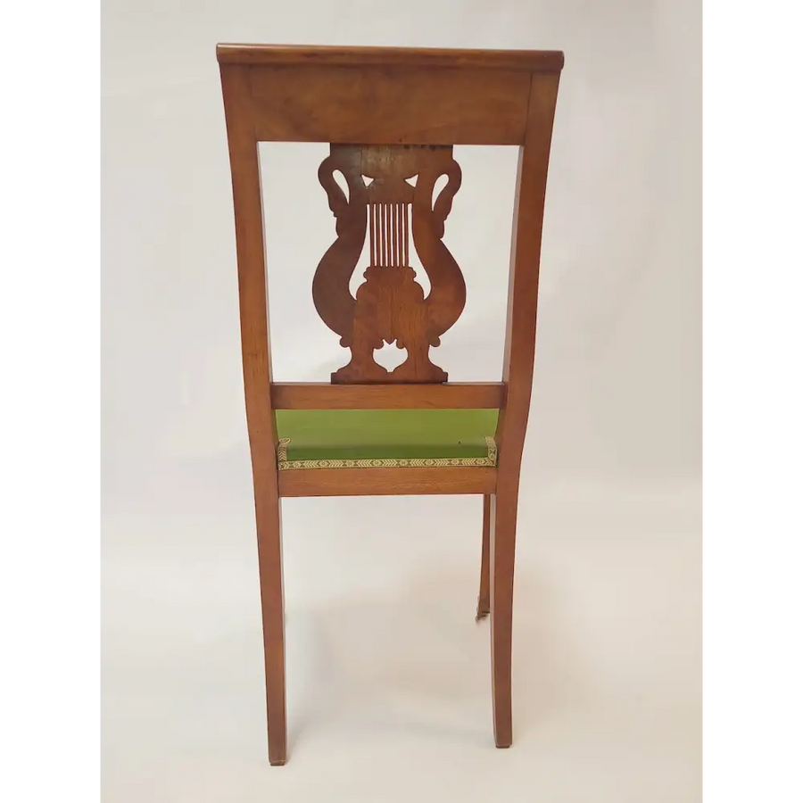 4 Nussbaum Stühle mit Schwäne um 1830 Frankreich / Empire -